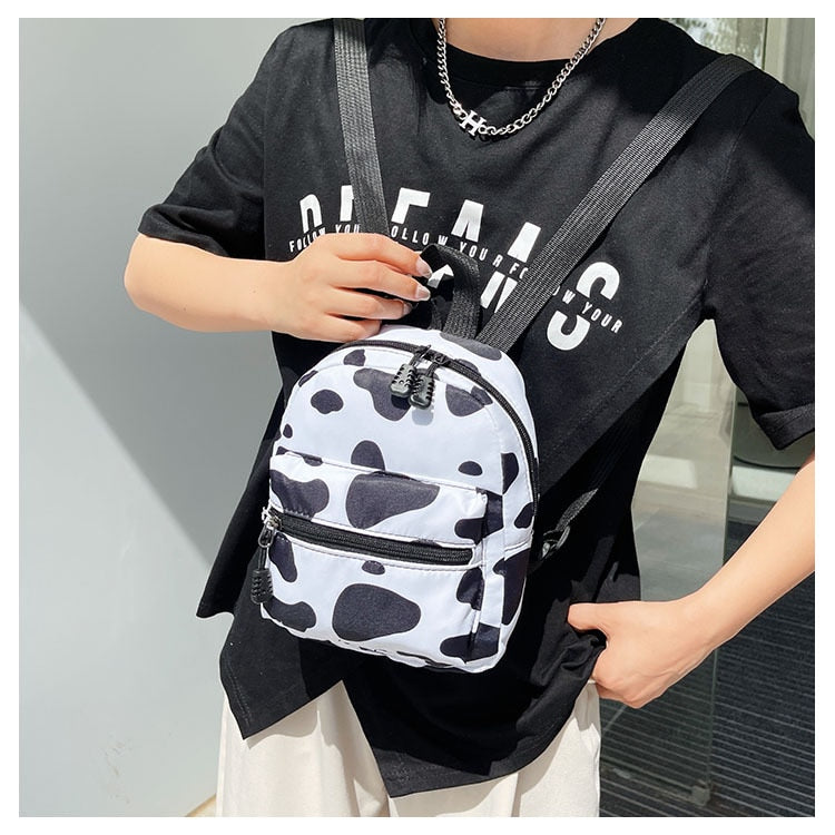 Mini cow print discount backpack