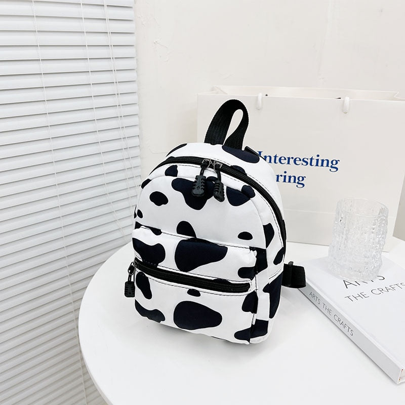 Cow print outlet mini backpack